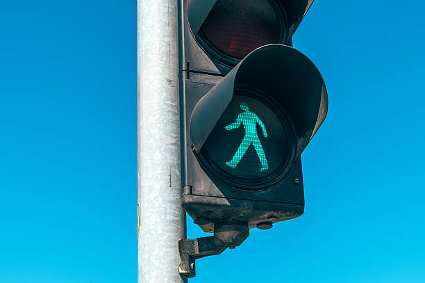 istock Green light, pedestrian stop light closeup on the street 2206606016