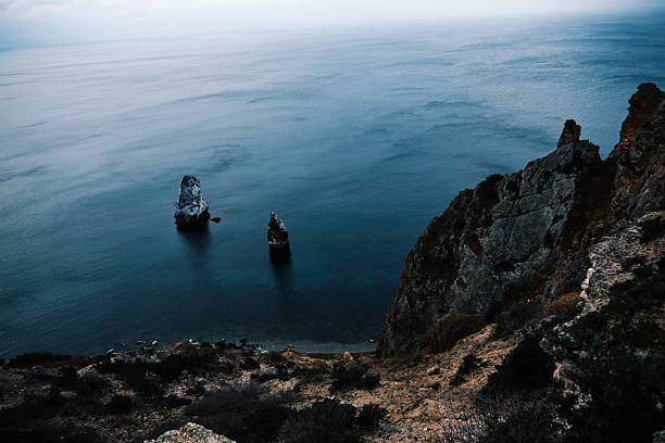 Aerial view of high rocky sea coastTriangle shape cliffs in Black sea. Morning view from high rocky sea coast