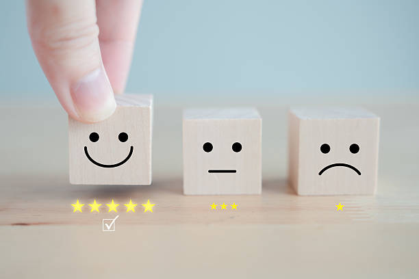 istock Customer satisfaction, feedback rating and customer experience concept. User choosing happy smiling face with 5 star for giving best service. 2206607827