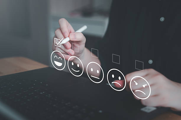 istock Customer satisfaction, online feedback rating and customer experience concept. User with digital pen choosing happy smiling face for giving best service. 2206611247