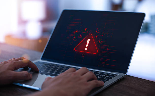 istock Cyber ​​attack alert on laptop. Cyber ​​attack on computer network. Virus, spyware, malware or malicious software. Businessman background. 2206617474