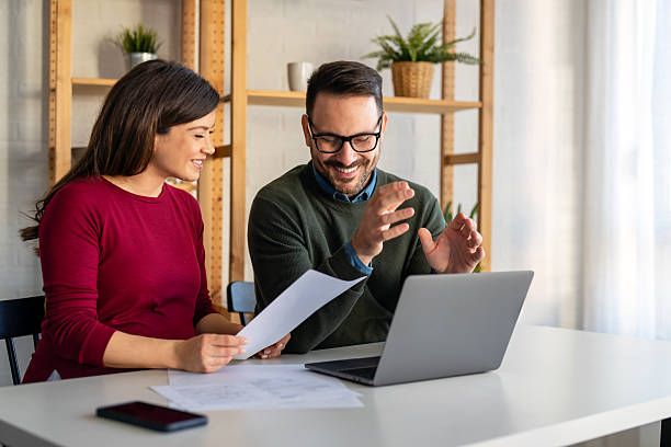istock Group of young multi-ethnic startup business team collaborating on project in modern office 2206617909