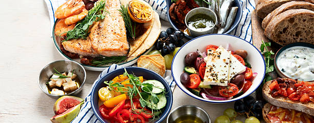 istock Mediterranean theme food table scene. 2206621202