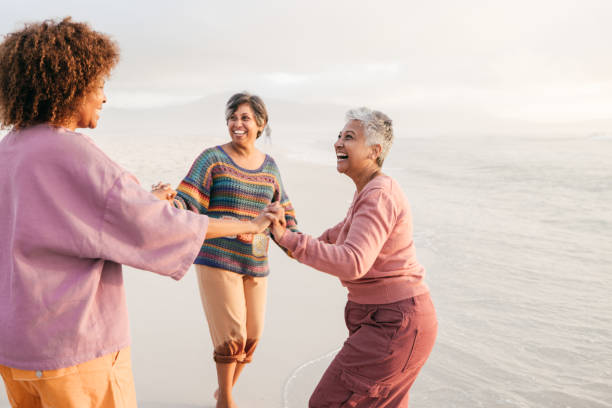 istock Rediscovering joy and healing with friends near the waves 2206626821