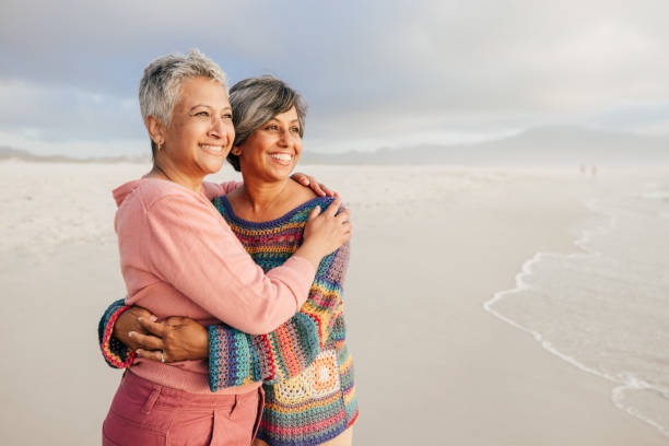istock Exploring the world and finding joy with friends by the shore 2206626841