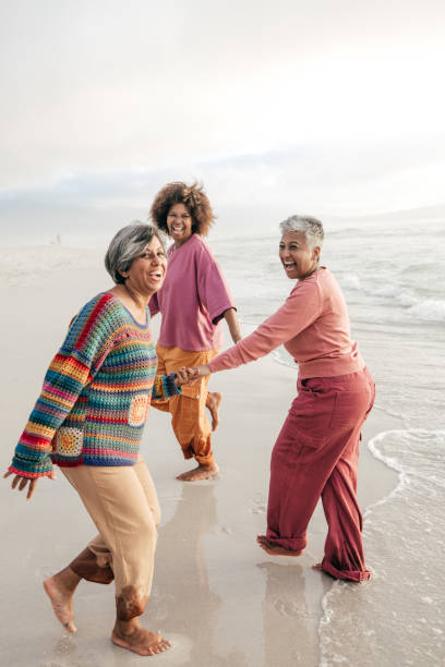 istock Healing through laughter and friendship by the ocean 2206626849