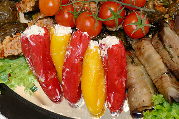 Peppers stuffed with cheese and vegetables on a buffet, Germany