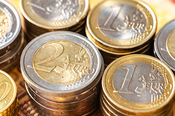 istock Stacks of coins close together. 2206629190