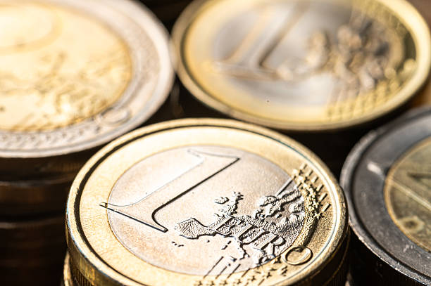 istock Stacks of coins close together. 2206629297