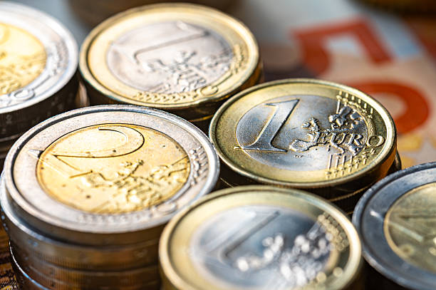 istock Stacks of coins close together. 2206629302