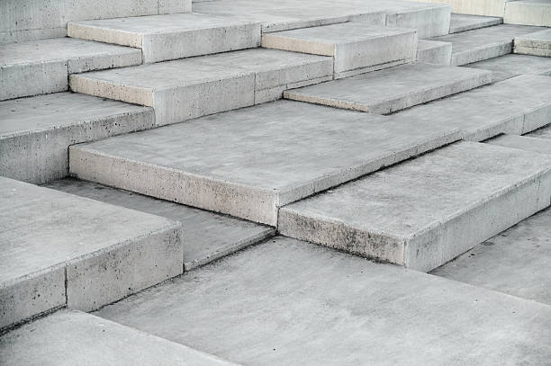 istock Concrete steps create geometric design in an urban landscape during daylight hours 2206631208
