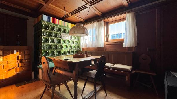 istock Wooden room with tiled stove 2206631452