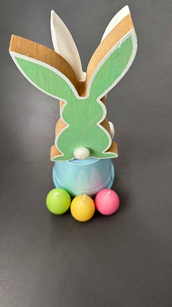 Easter bunnies and colorful eggs around them