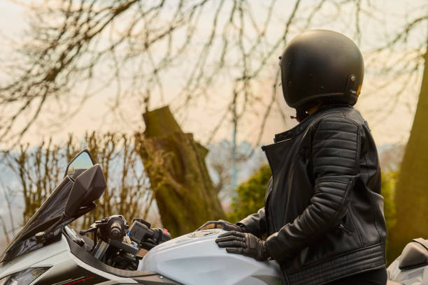 istock Young Woman Exploring the Countryside by Motorcycle 2206633299