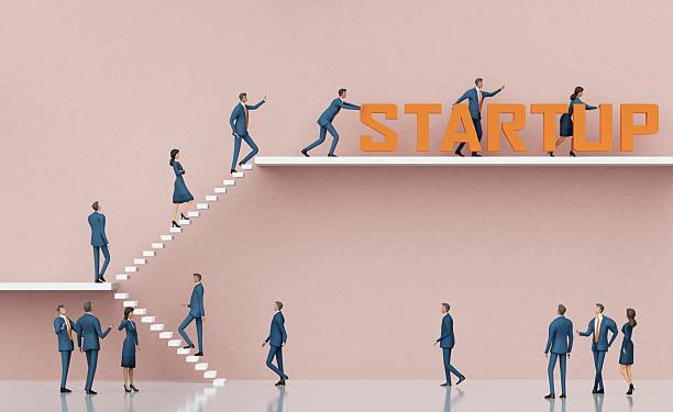 istock Business people pushing up STARTUP sing, working hard for success. 3D rending 2206633825