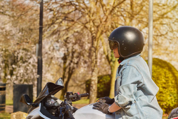 istock Young Woman Exploring the Countryside by Motorcycle 2206635026