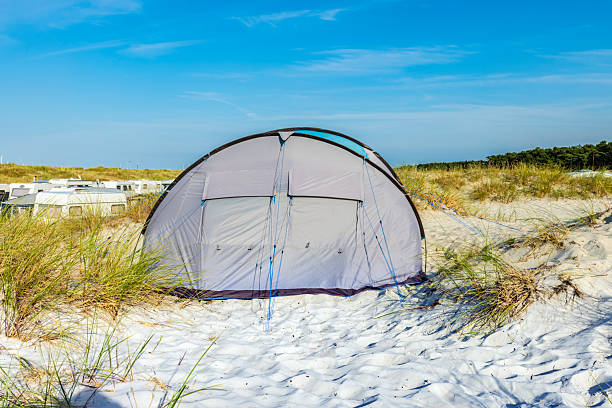 istock Tent in the dunes 2206635345