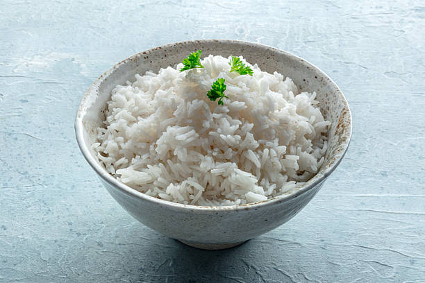 istock White rice, cooked. A bowl of boiled long grain rice, a simple side dish 2206636321