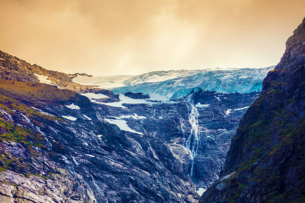 Briksdal glacier hike. Briksdalsbreen Mountain during sunrise. Norway