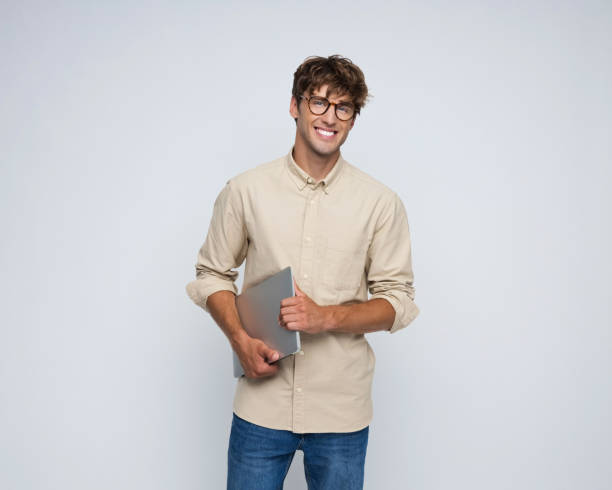 istock Portrait of confident young man 2206644373