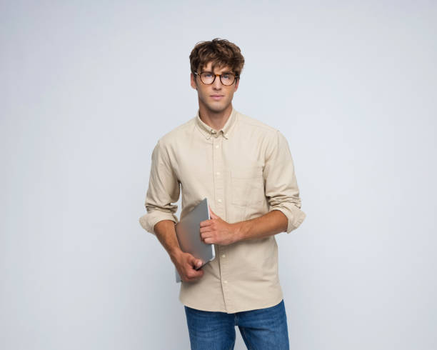 istock Portrait of confident young man 2206644555
