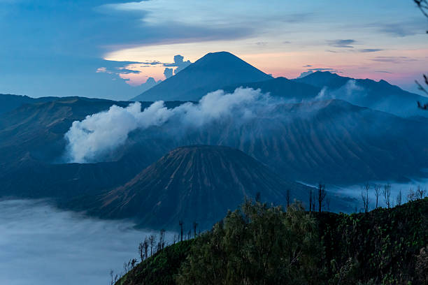 istock Cloudy sunrise over Mount Bromo in Indonesia 2206646986