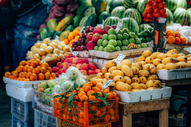istock Colorful Assorted Fruits Displayed at a Vibrant Market Stall 2206647738