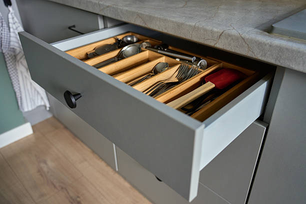 istock Modern kitchen drawer with stainless steel cutlery and cooking utensils 2206651501