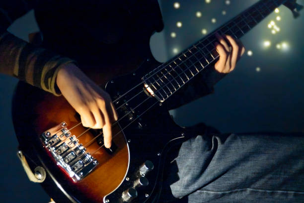 istock Bassist playing at a private performance 2206652197