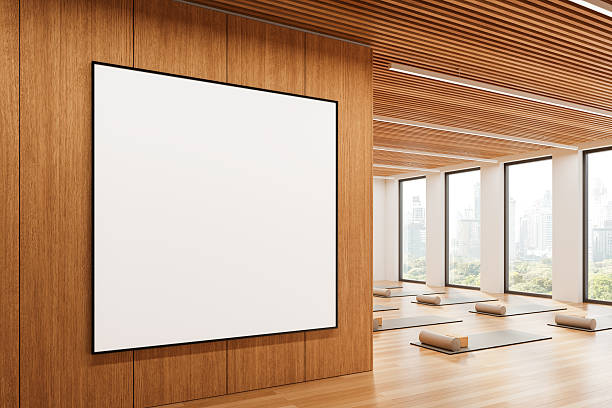 istock Blank poster on wooden wall in modern yoga studio. 3D Rendering 2206652602