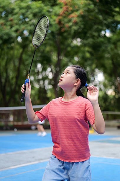 istock Little girl play badminton 2206654209