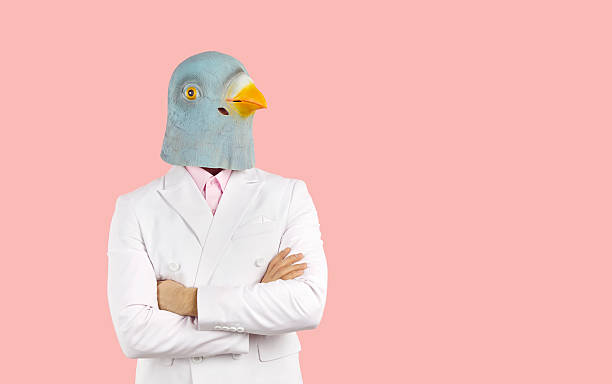 istock Funny man in bird head rubber mask 2206656299