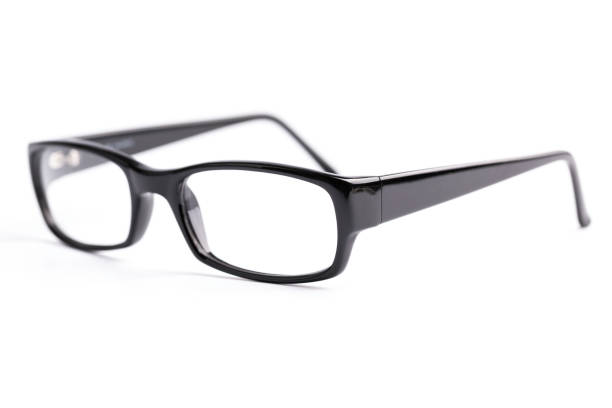 istock Stylish black reading glasses resting on a white surface, ready for use in a cozy reading nook or office environment 2206663702