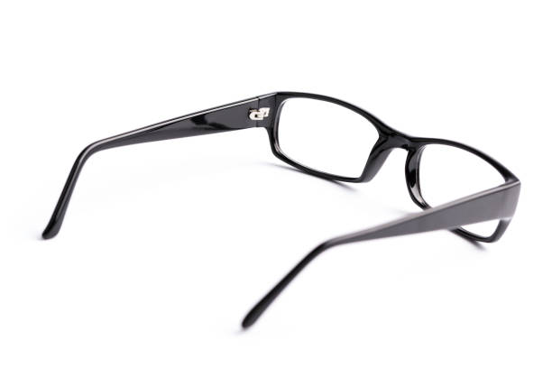 Black reading glasses are showcased against a plain background, emphasizing their sleek design and functionality. Ideal for both casual and professional settings, these glasses offer clarity and style for everyday reading needs.