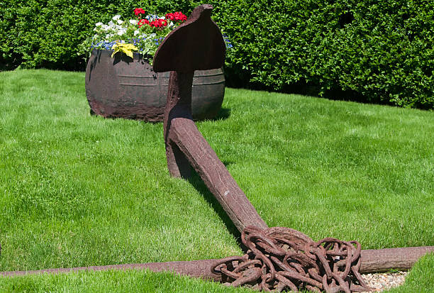 View over old rusty anchor to Vestfjorden and Lofotens from Tranoy island, Norway