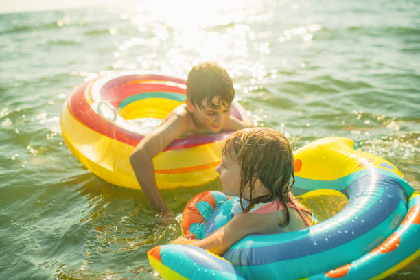 istock Children enjoying beach holidays 2206666298