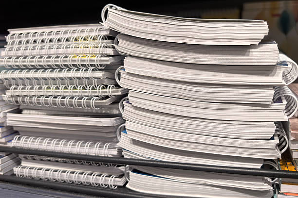 istock Stacked notebooks on a store shelf inviting creativity and inspiration 2206666352