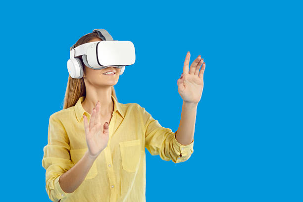 istock Woman in vr glasses explore new horizons 2206669433
