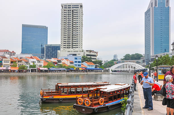 Singapore - May 10, 2025 : Clarke Quay riverside sunset view