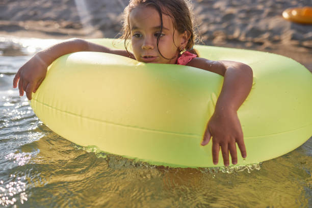 istock Beautiful girl enjoying summer vacation 2206671546