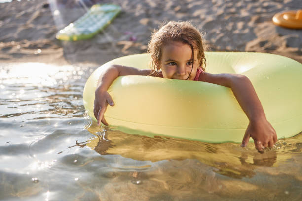 istock Beautiful girl enjoying summer vacation 2206671567