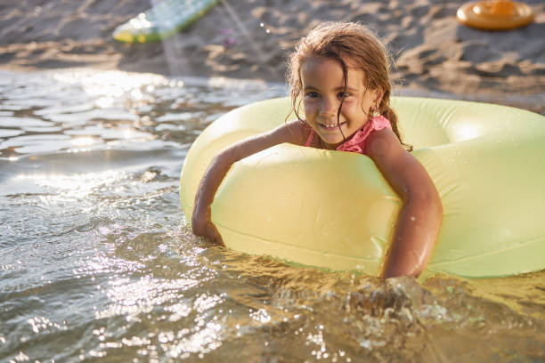 istock Beautiful girl enjoying summer vacation 2206671609