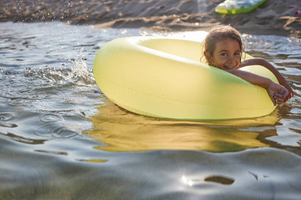 istock Beautiful girl enjoying summer vacation 2206671633
