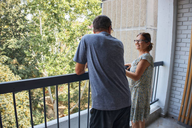 istock Senior couple moving into new home 2206675074