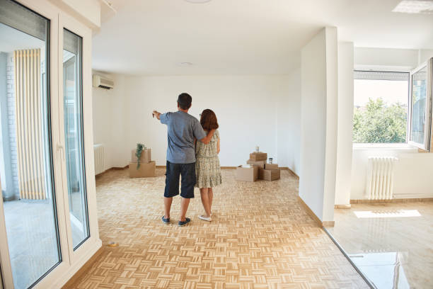 istock Senior couple moving into new home 2206675271