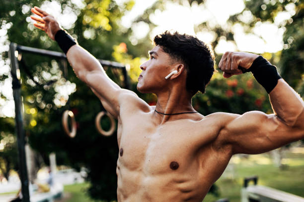 istock Calisthenics athlete doing bodybuilding poses 2206676116