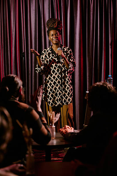 istock Performing Stand-Up Comedy on Stage with Microphone 2206678261