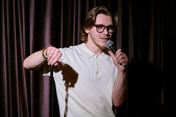 istock Performing Stand-up Comedy on Stage with Microphone 2206678365