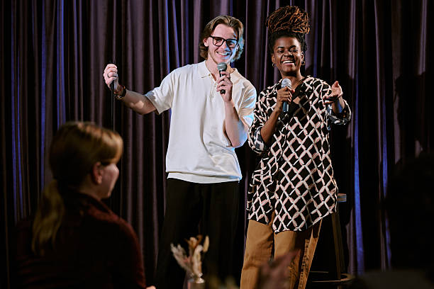 istock Performing Stand-Up Comedy Together on Stage at Club 2206679132