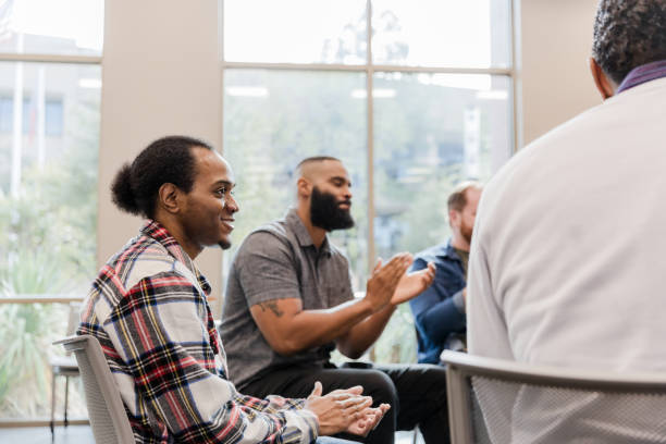 istock Group Therapy Session: Diverse Men Discussing Mental Health 2206686237